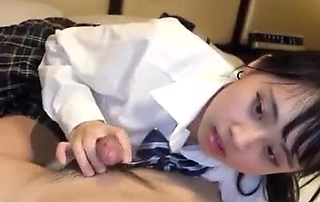 Ravishing 18-year-old Japanese brunette with slender curves enjoys amateur blowjob and steamy creampie action.