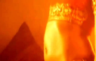 Exotic Indian dancer, the Phoenix Lady, performs a voluptuous solo striptease to hypnotic music.