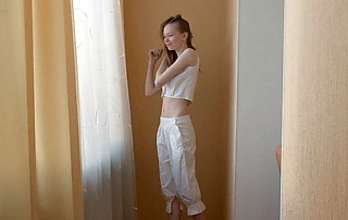 Leggy teen spreads her innocent honeypot